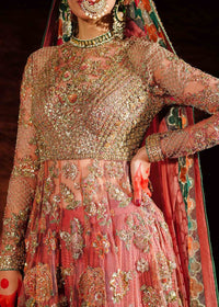 Traditional embroidered outfit with intricate designs on a dark background,Saaz by Hussain Rehar